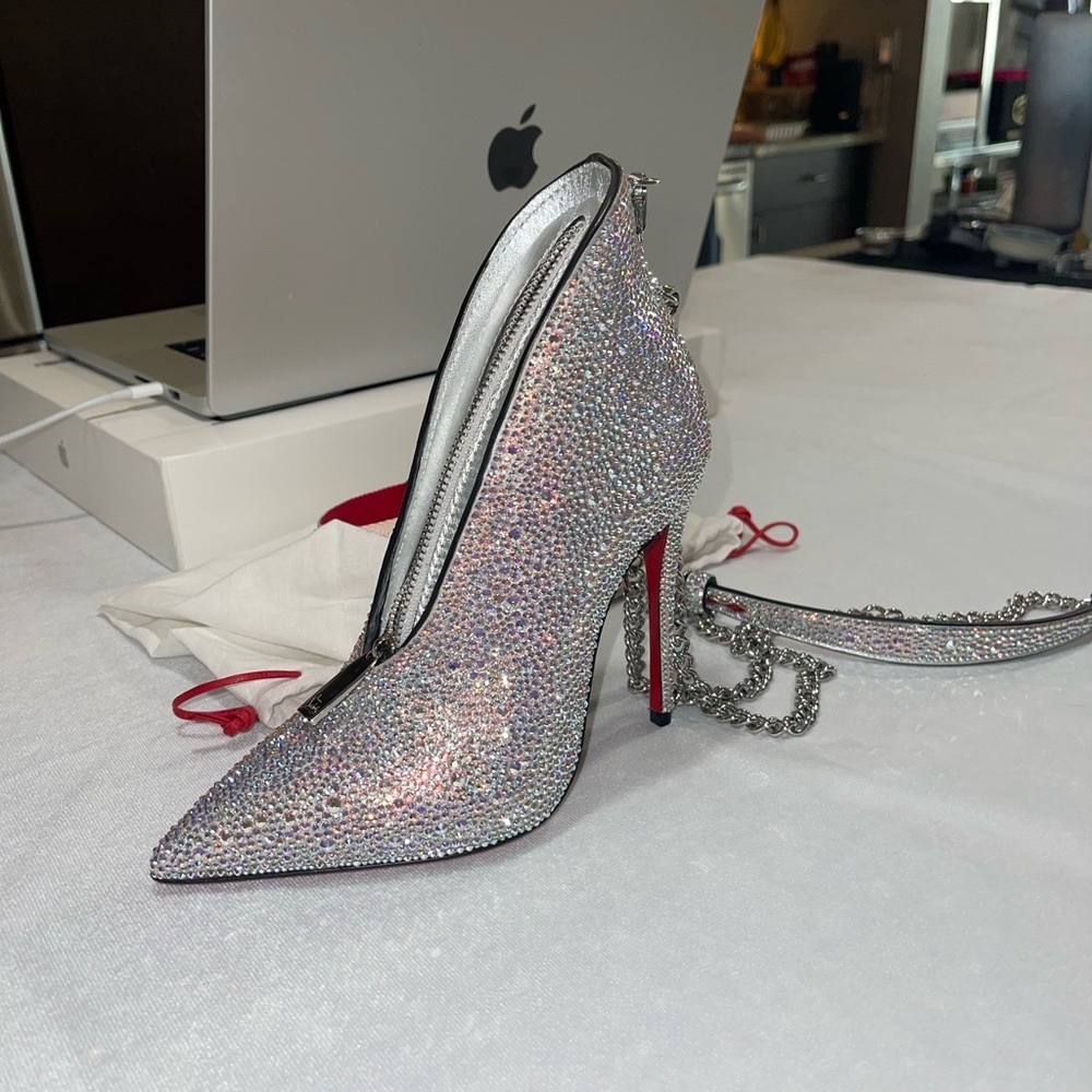 Christian Louboutin heel clutch
